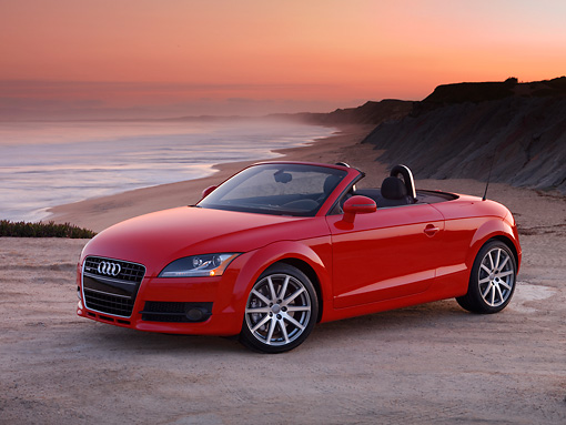 2008 Audi Tt Convertible Red 3 4 Side View On Sand Kimballstock